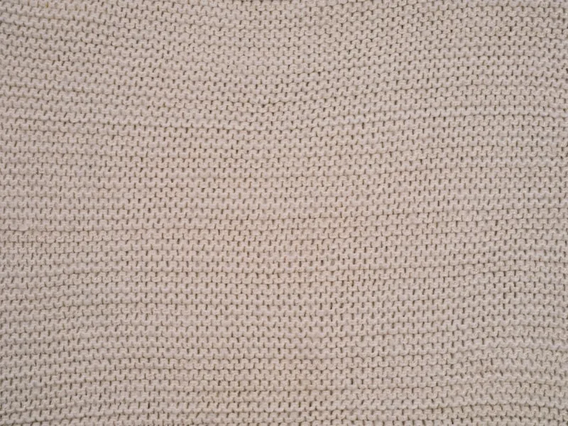 Close-up detail of compression fabric showing knit weave and material quality