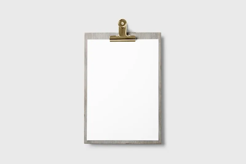 Close-up of a clipboard with checklist and verification marks for quality control