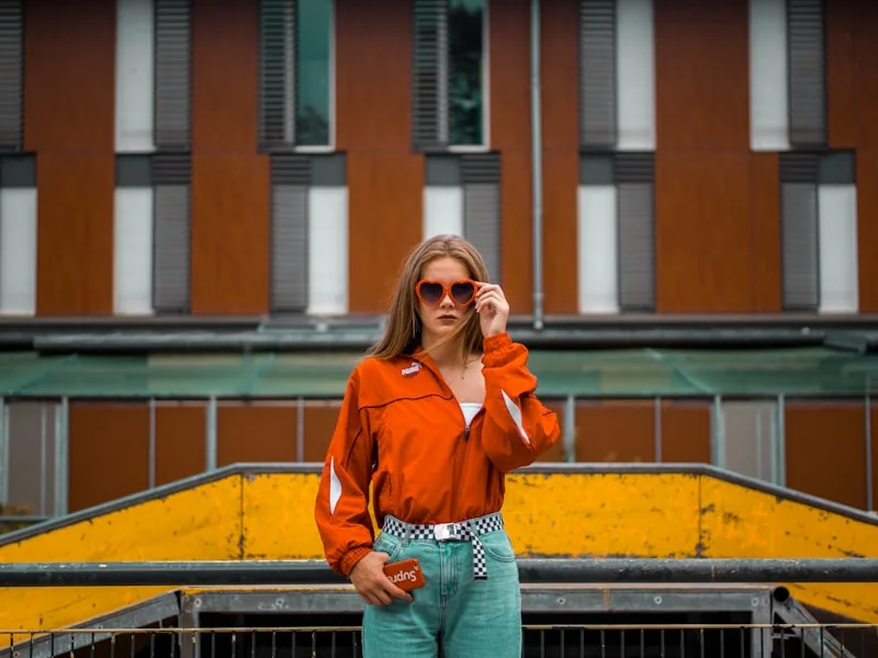 Person wearing casual streetwear clothing pieces styled together in an urban setting