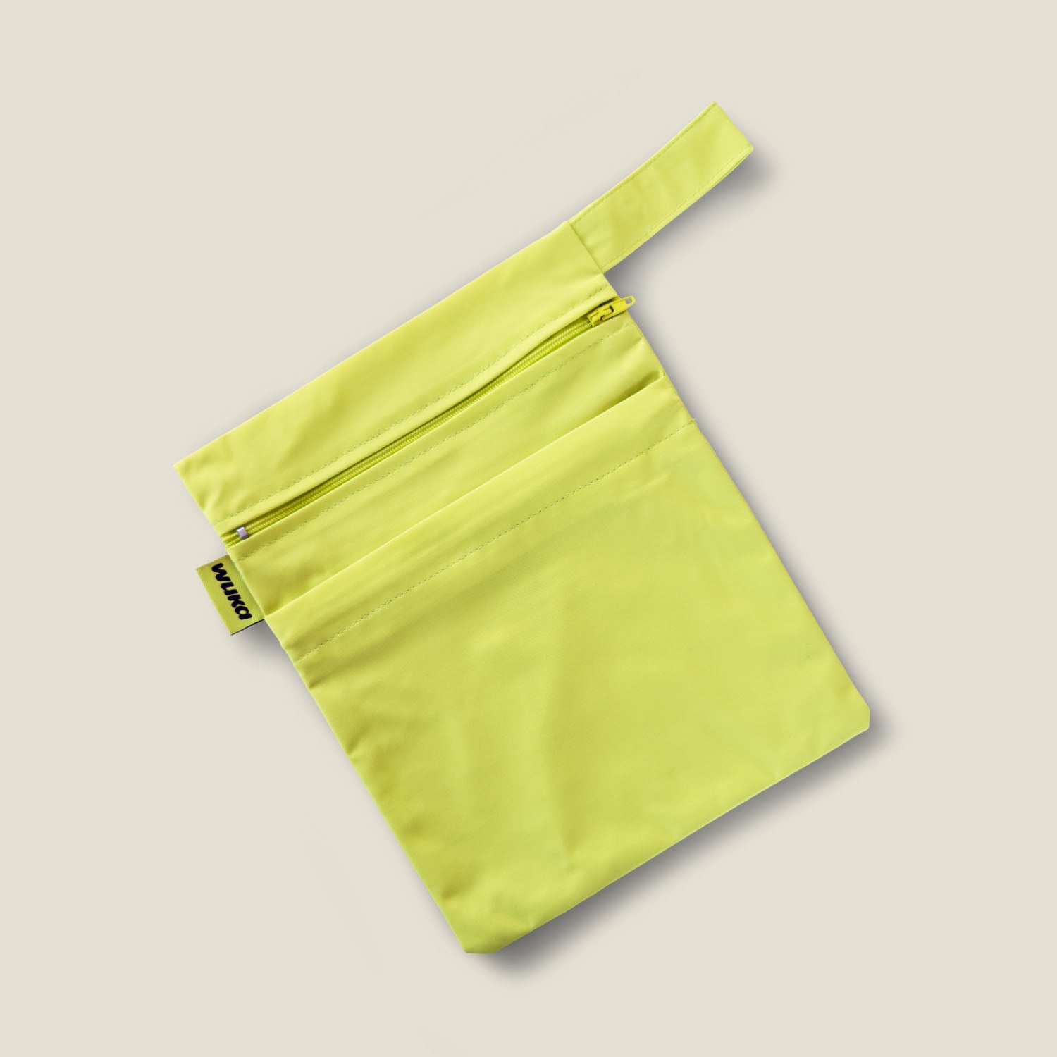 WUKA Two Pocket Changing Bag in Lime Punch for carrying period pants